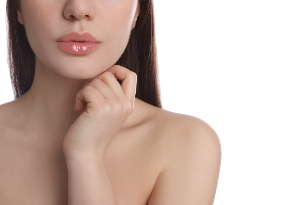 Woman with beautiful full lips after dermal fillers
